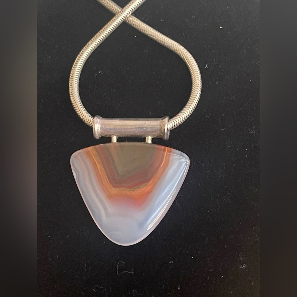Natural jasper stone. It’s so smooth, it almost feels like a talisman or fetish. - Picture 3 of 6